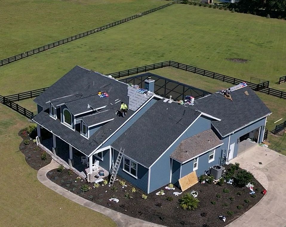 Aerial view of roof replacement in Ocala, FL - CBC Construction Group professional roofing crew